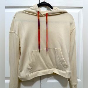Madewell pullover cream jacket with multi colored strings